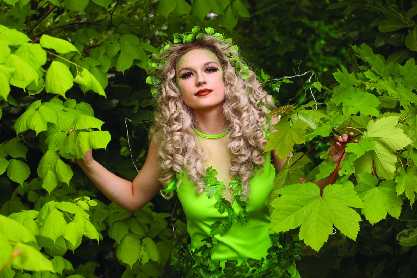 Hair and Media make up student's work, woman in green forest