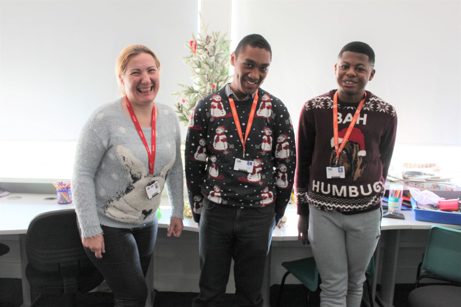 Students and staff in Christmas jumpers