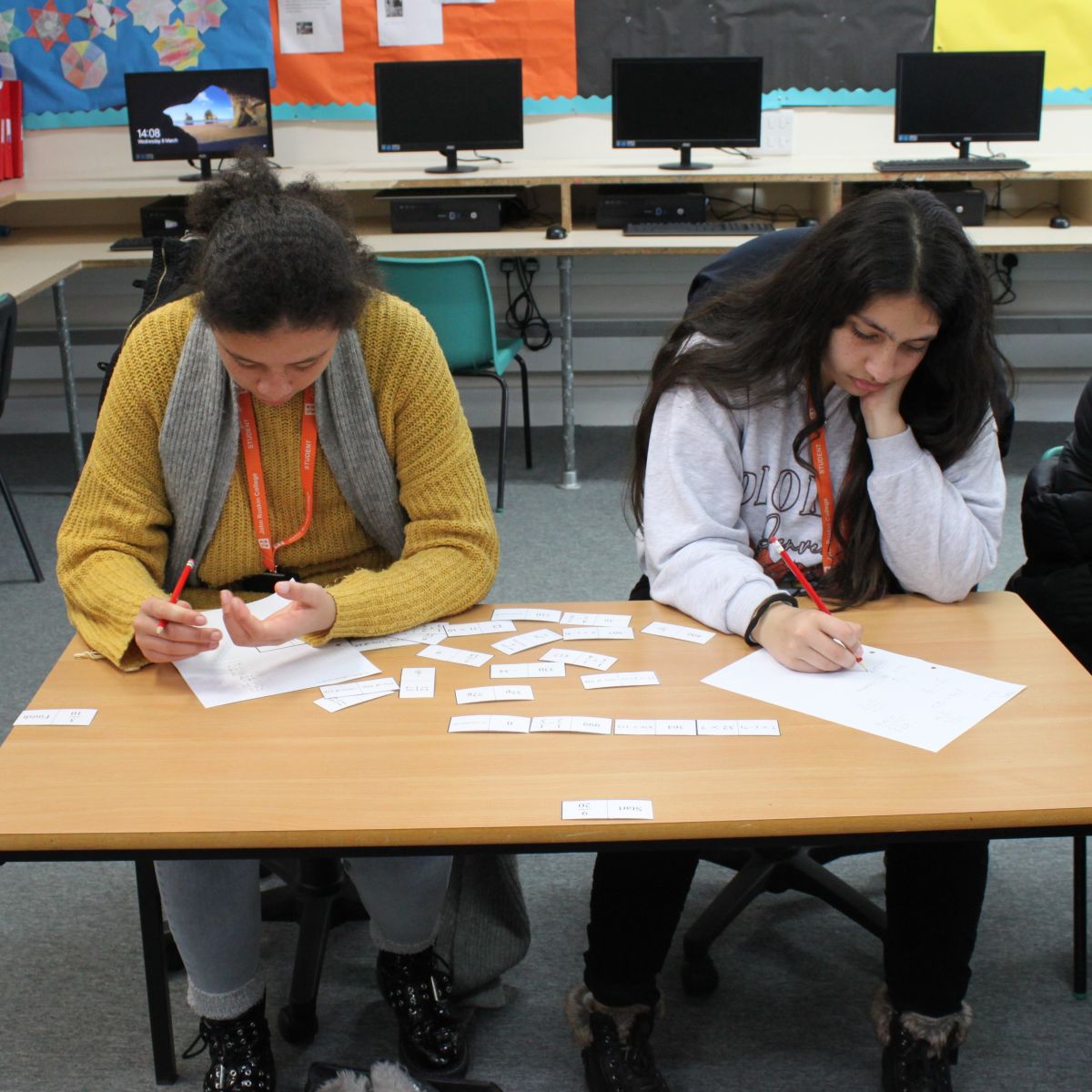 Chanttelle and Eman working on their tarsia puzzle