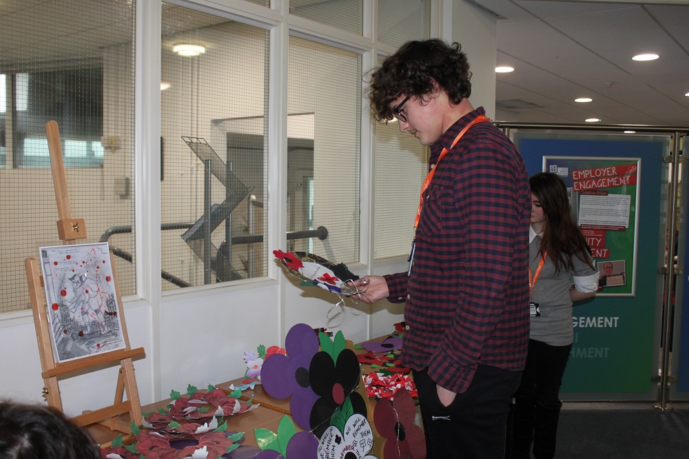 A student looking at a display relating to Armistice Day