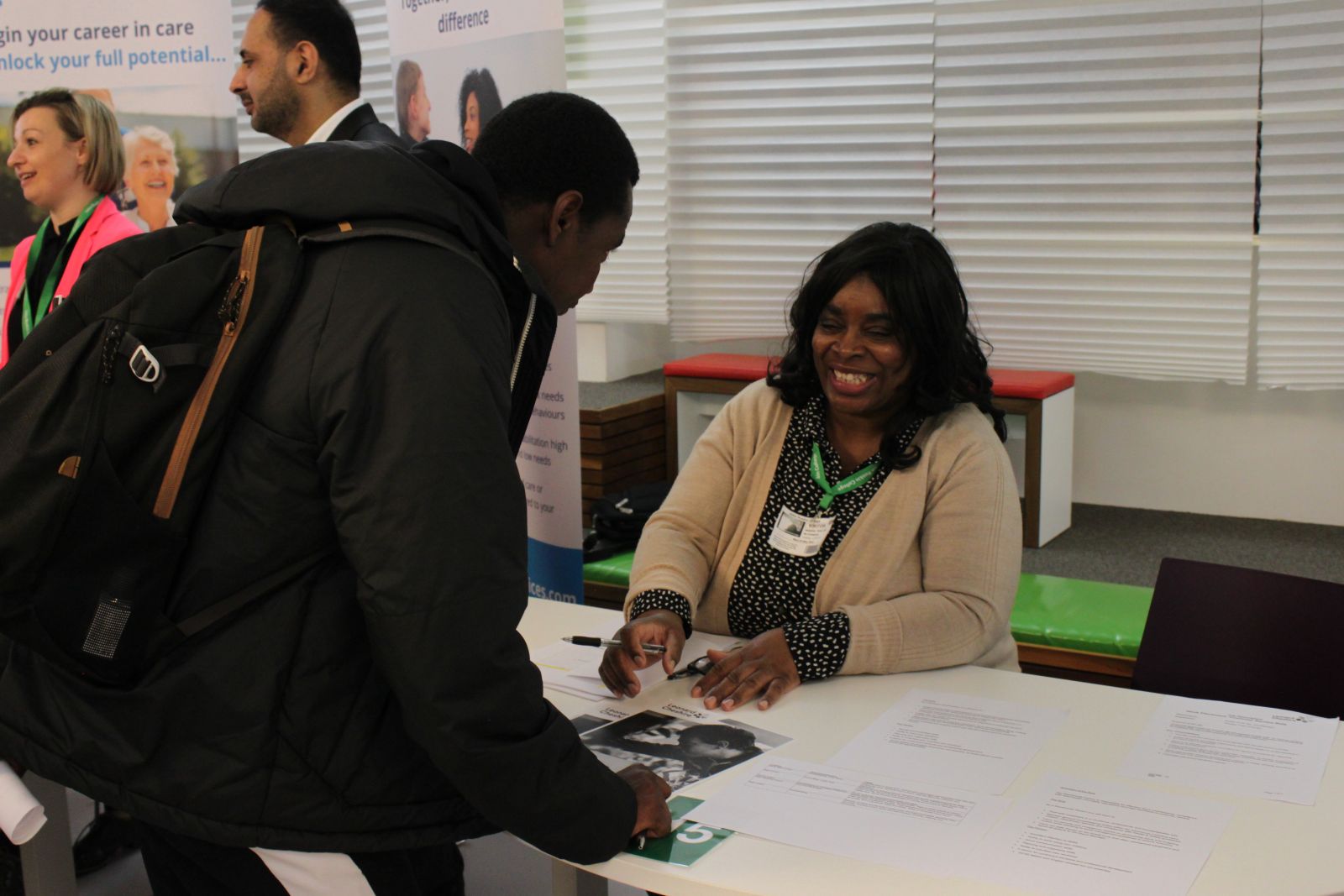 Employer talking to student at careers fair