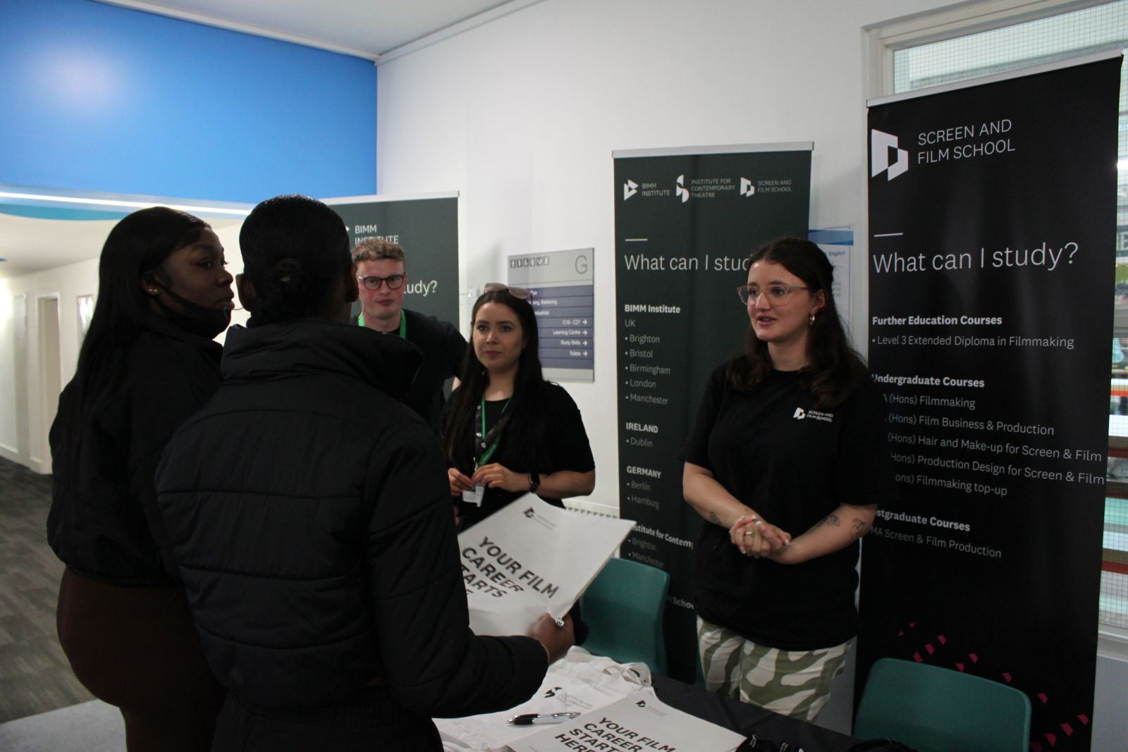 students talking to employers at careers fair